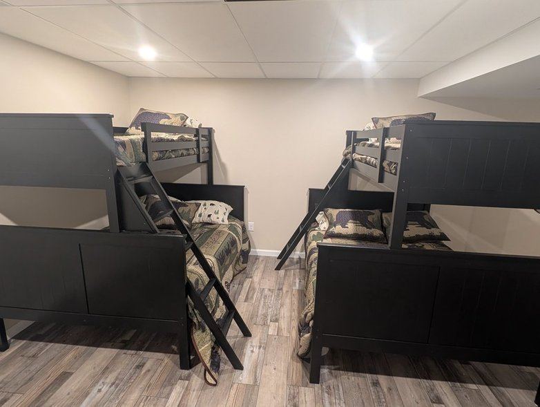 Bunk room with two twin-over-full bunks